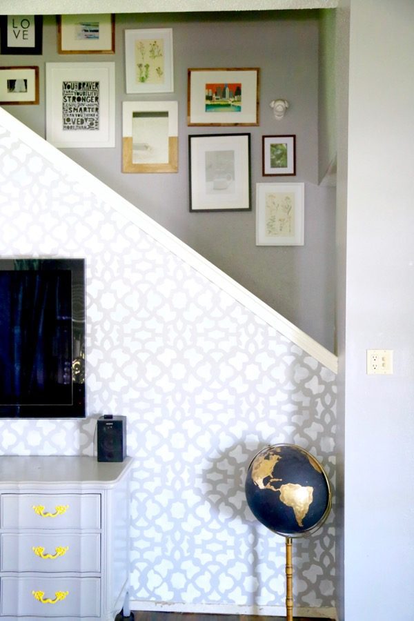 Want to know the secret to the perfect gallery wall every time? This post will tell you exactly how to achieve an awesome staircase gallery wall, and it has a trick to make hanging anything much easier! 