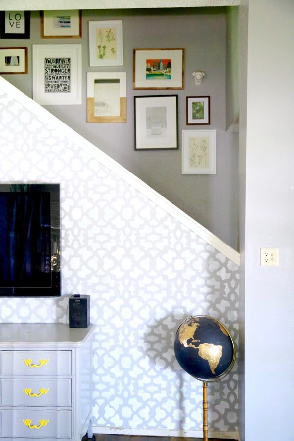 Want to know the secret to the perfect gallery wall every time? This post will tell you exactly how to achieve an awesome staircase gallery wall, and it has a trick to make hanging anything much easier!
