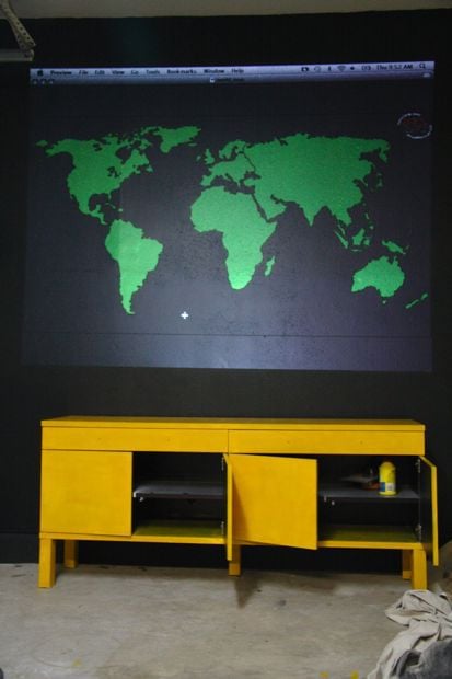 a map projected onto a black wall