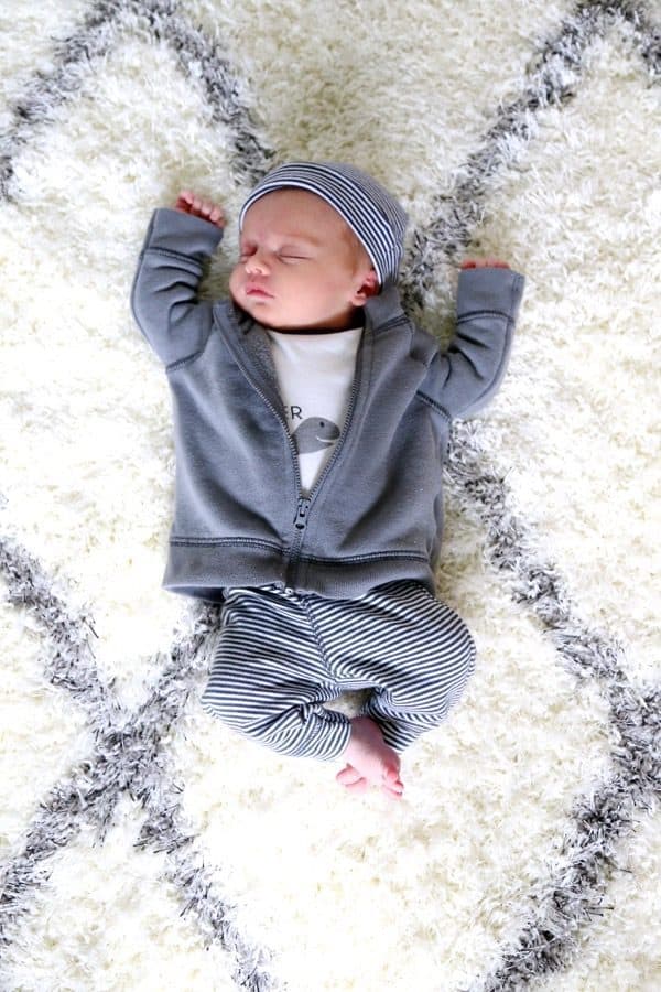 Dying for some sleep? Here are some tips and tricks along with a detailed look at one family's experience with getting their infant to sleep through the night at 5 weeks old! 