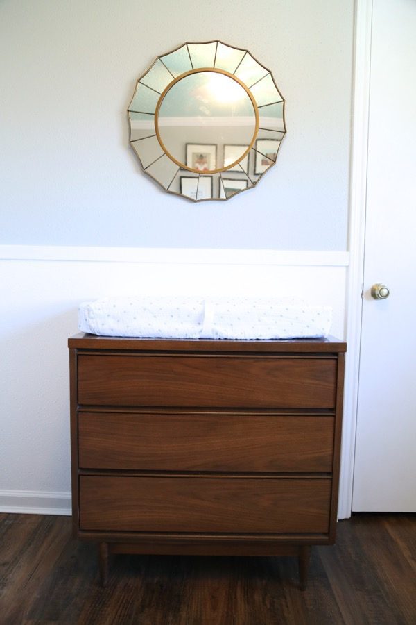 A nursery with vinyl plank flooring 