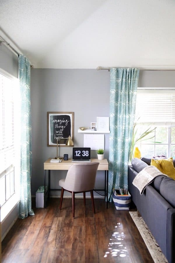 office nook in a living space in a room with vinyl plank flooring 