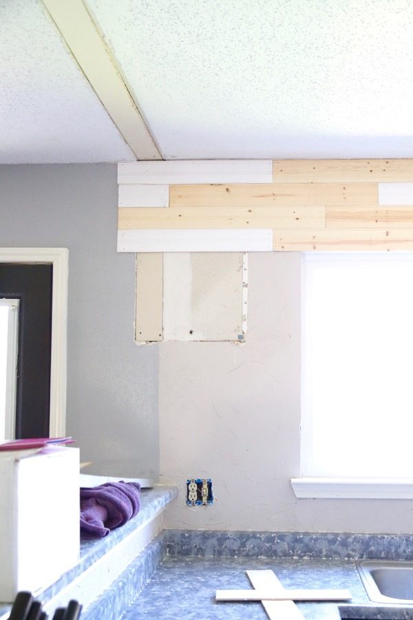 Beginning to install beadboard backsplash