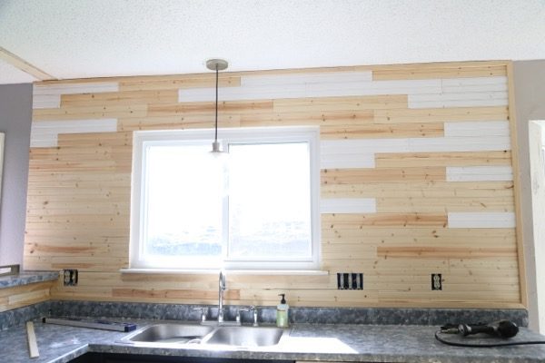 Fully installed unpainted beadboard backsplash