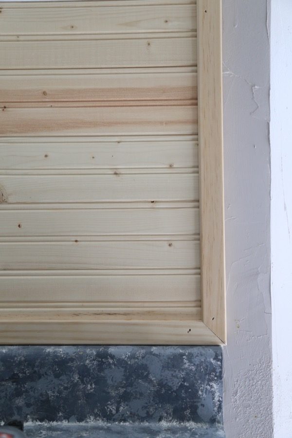 Closeup image of beadboard backsplash with trim