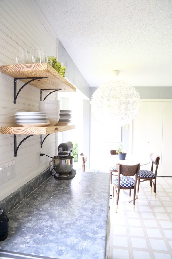 kitchen with bead board backsplash and open shelving