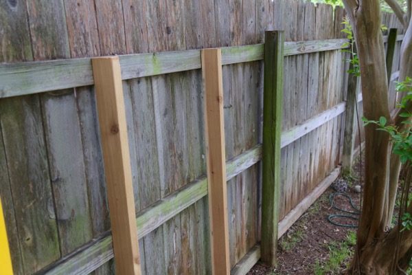 Fence with ledger boards attached 