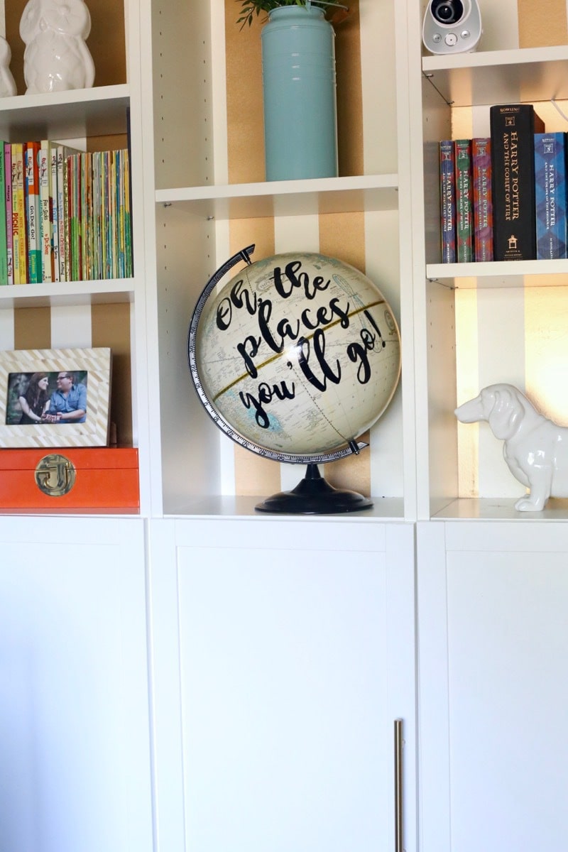 I LOVE this globe art! It's so cute and so incredibly easy to make! Learn how to make your own in under and hour and for just a couple of bucks - this is seriously one of the simplest DIY projects ever! 