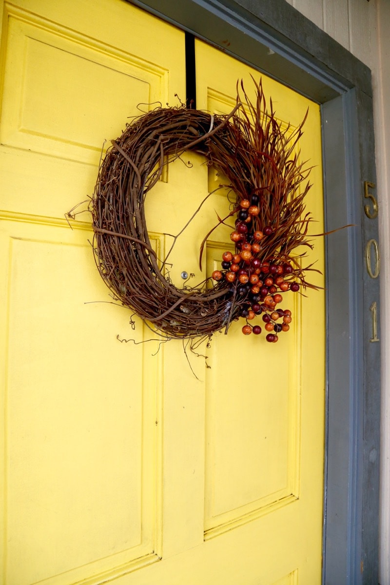 It doesn't have to be hard or expensive to decorate your home for fall! Here's a quick and easy DIY fall wreath idea - it'll only take you a few minutes to put together, and it's super affordable. 