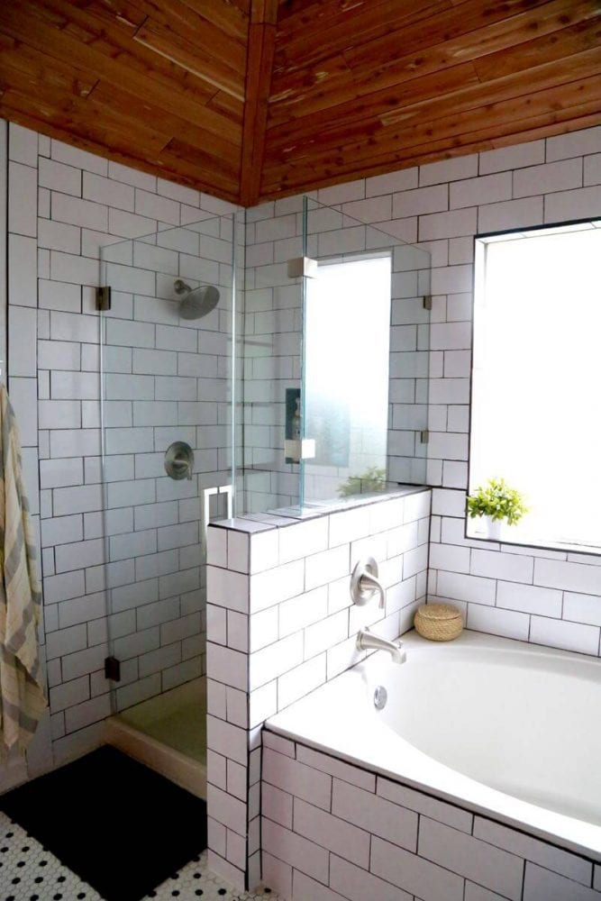 black and white bathroom with cedar ceiling