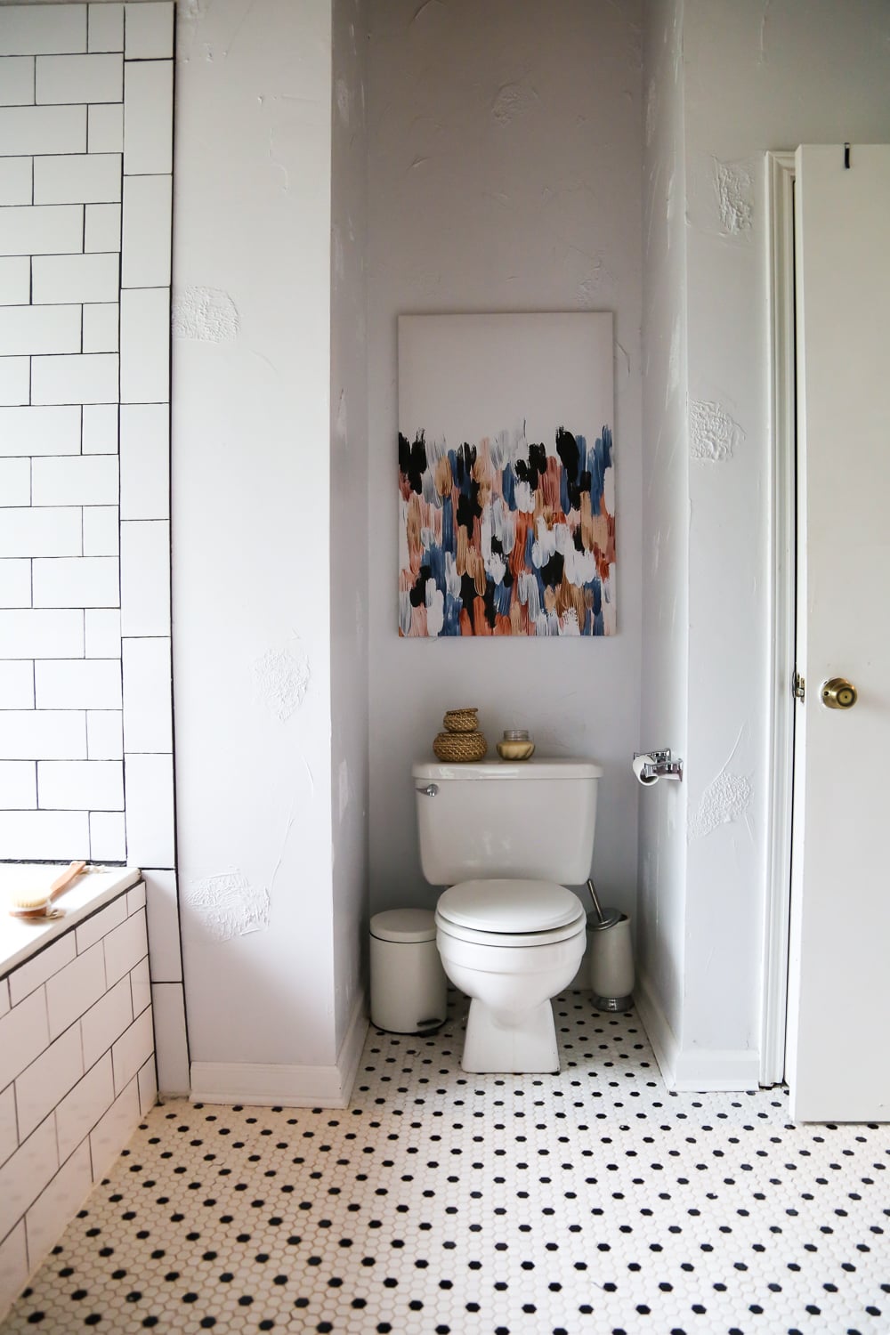 This master bathroom remodel is absolutely gorgeous. SO many inspiring ideas, gorgeous black and white tile, and it's all one big DIY renovation! You HAVE to see the rest of the photos!