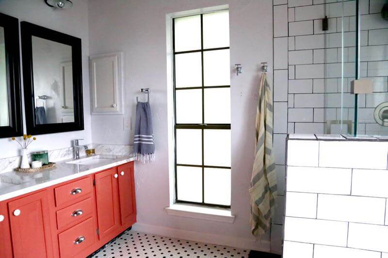 This master bathroom remodel is absolutely gorgeous. SO many inspiring ideas, gorgeous black and white tile, and it's all one big DIY renovation! You HAVE to see the rest of the photos!