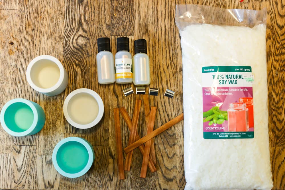 Supplies for making your own candles, including wax, DIY candle holders, and candle scents