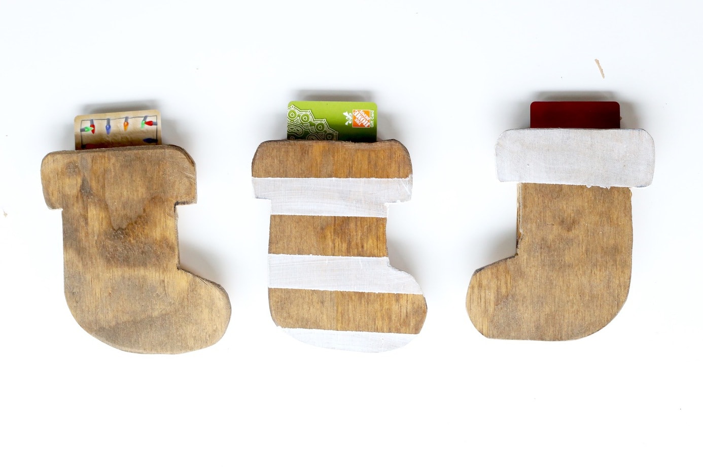 Need a unique and creative way to give a gift card? These wooden stocking gift card holders are so cute and so simple to make! This is the perfect gift idea for anyone on your list. 