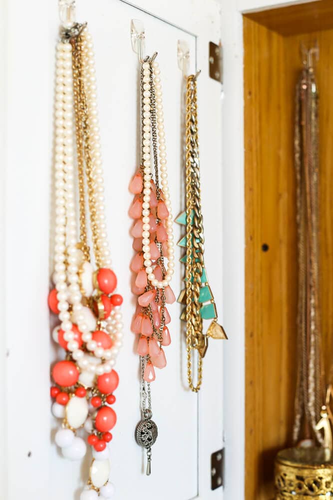 DIY necklace holder in a medicine cabinet