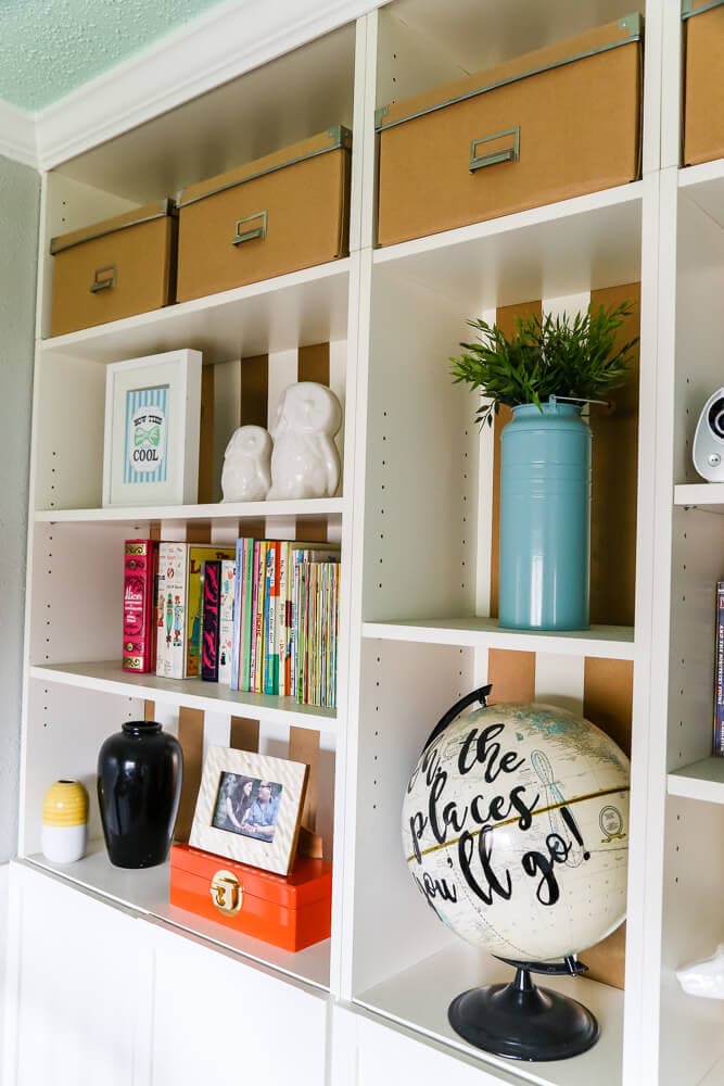 This gender-neutral nursery has a ton of great ideas for simple decor that will last through the toddler years. There's tons of storage for easy organization, and it has a very modern and sophisticated feel! Love it! 