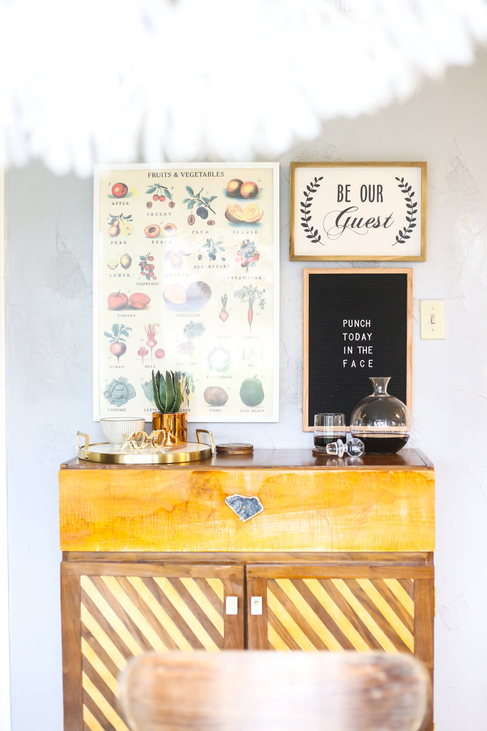 Gorgeous gallery wall inspiration, ideas for what to hang above your bar cart, felt letter board inspiration