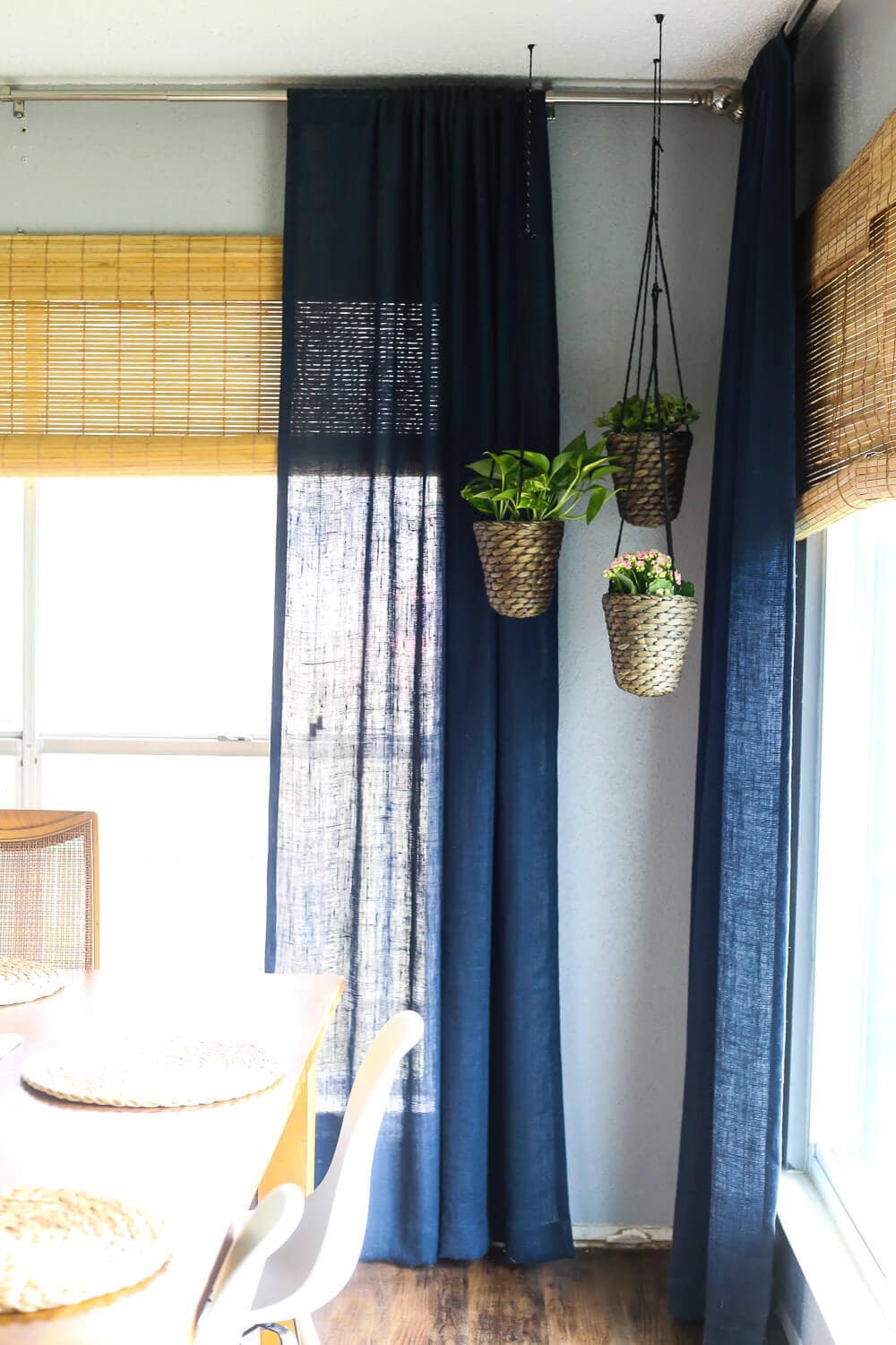 How to add simple hanging planters from IKEA to create this DIY indoor hanging planter display. It's a really simple idea, but makes a big statement in your room! 