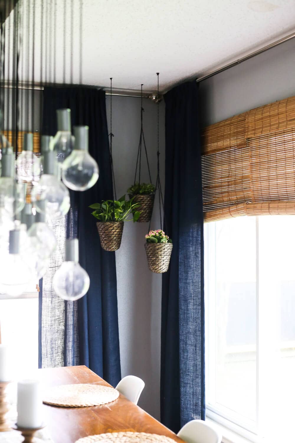 How to add simple hanging planters from IKEA to create this DIY indoor hanging planter display. It's a really simple idea, but makes a big statement in your room! 