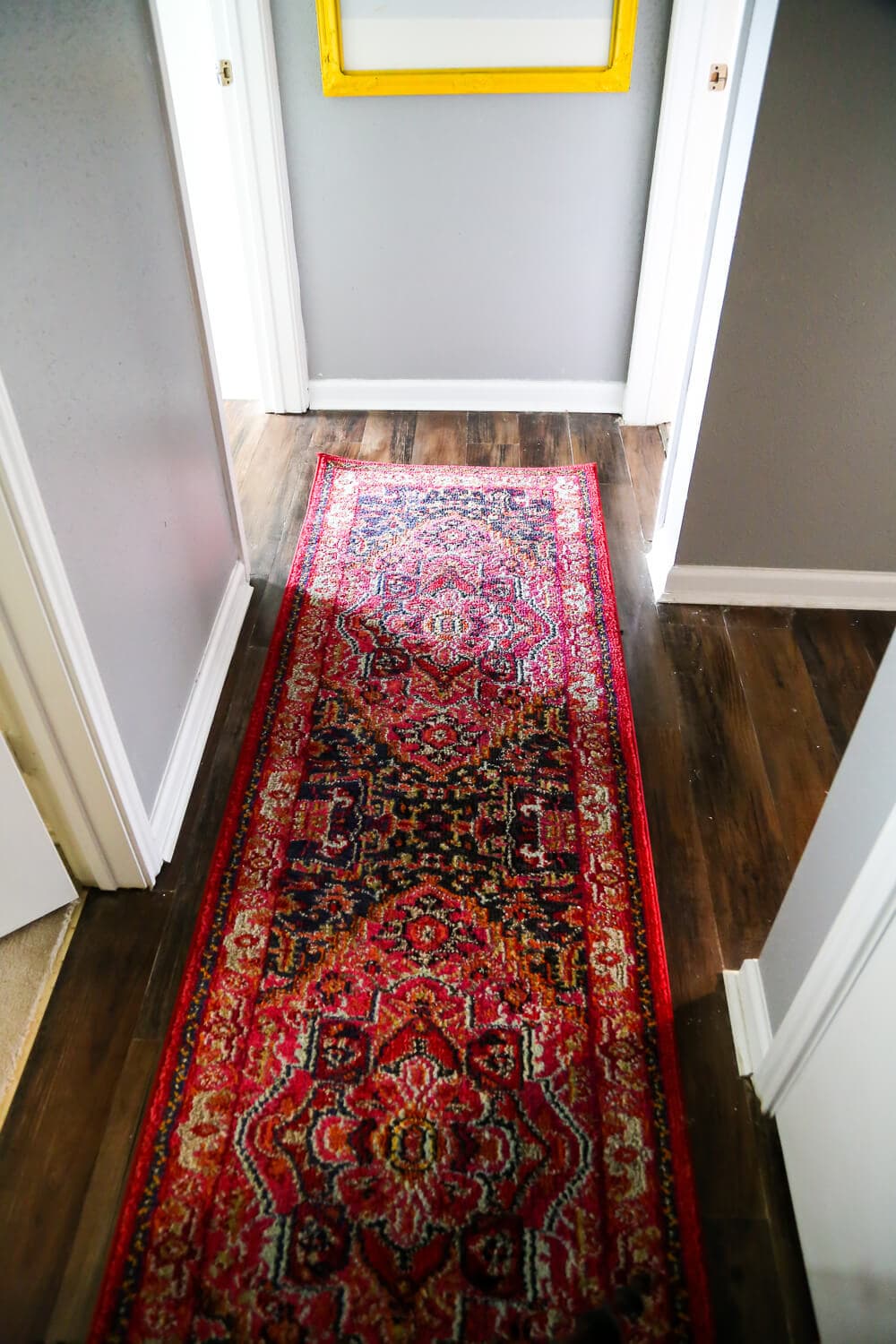 A quick, easy, and gorgeous hallway update. Sometimes all it takes is a new runner and some pretty lights to make a major difference! 