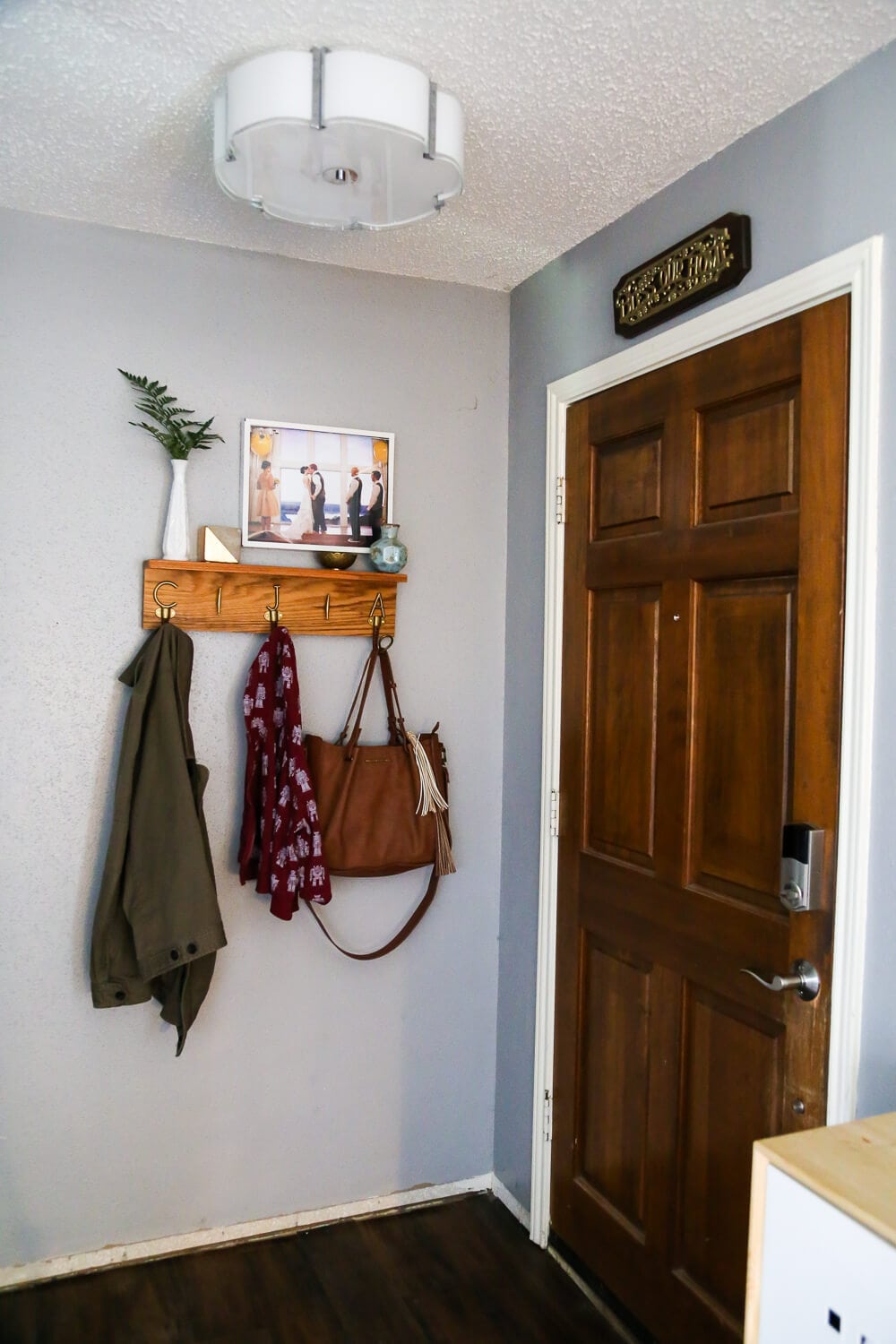 A quick, easy, and gorgeous hallway update. Sometimes all it takes is a new runner and some pretty lights to make a major difference! 