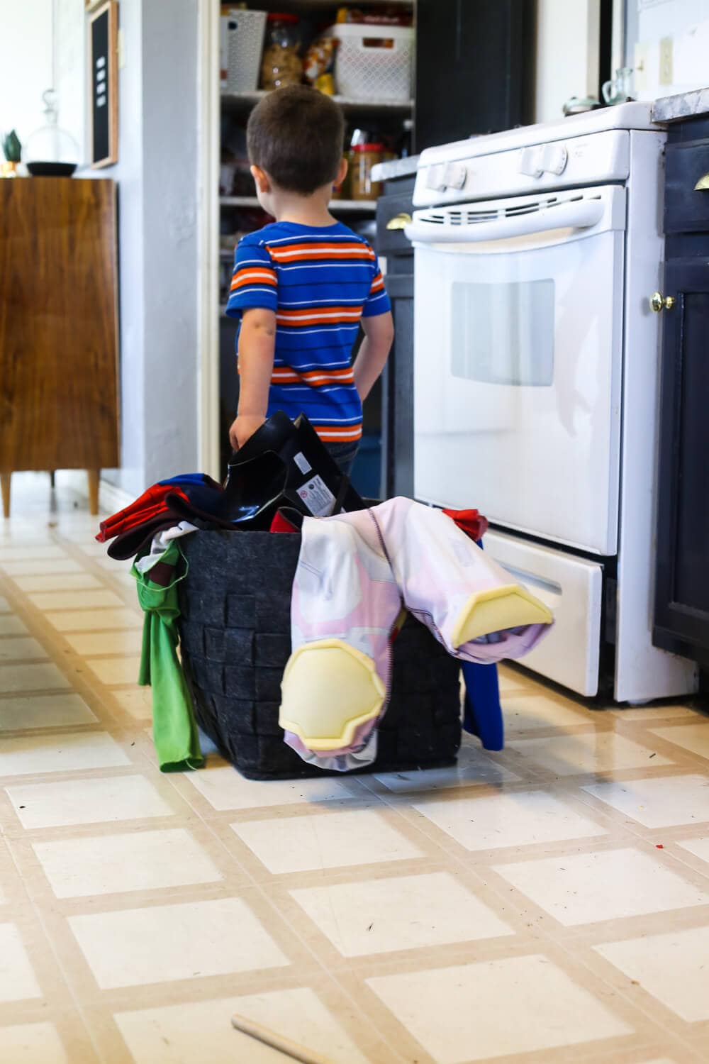 Tips, tricks, and ideas for getting your toddler or preschooler to help around the house. Ideas for chores that young children can do! 