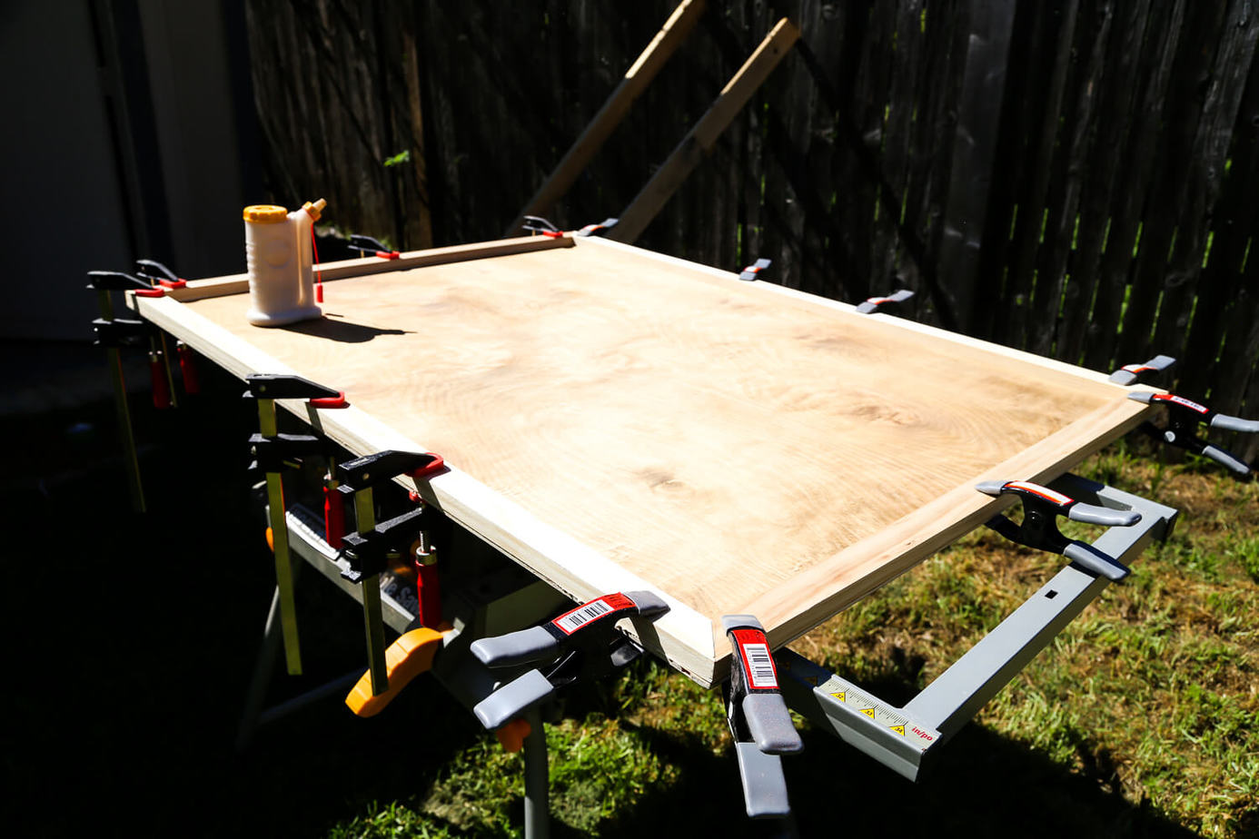 How to create a gorgeous large-scale wood wall art piece for your home. You just need some glue and a saw to cut it down! It's so easy that even a total beginner can do it, and it's absolutely gorgeous! 