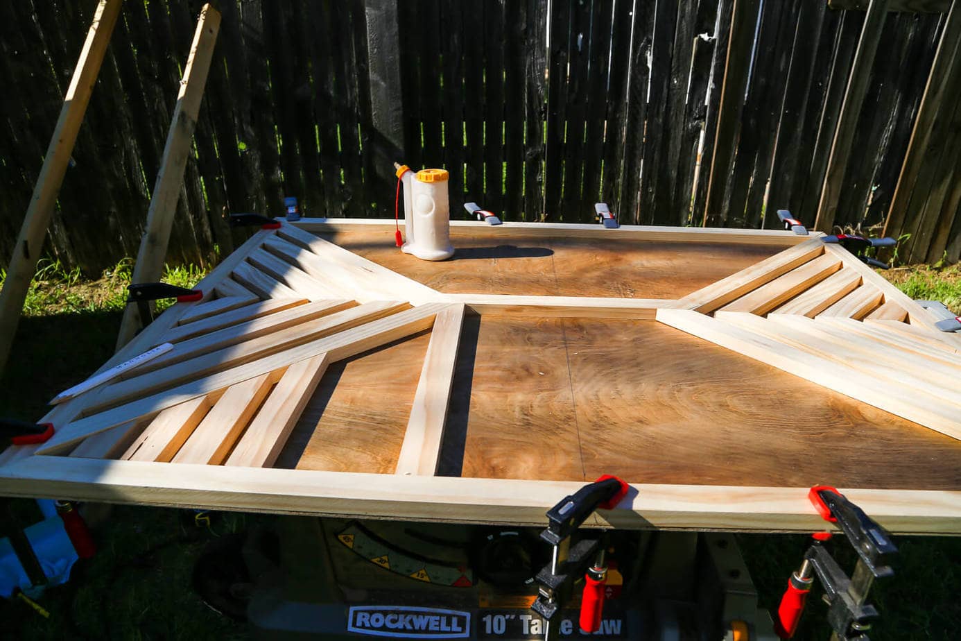How to create a gorgeous large-scale wood wall art piece for your home. You just need some glue and a saw to cut it down! It's so easy that even a total beginner can do it, and it's absolutely gorgeous! 