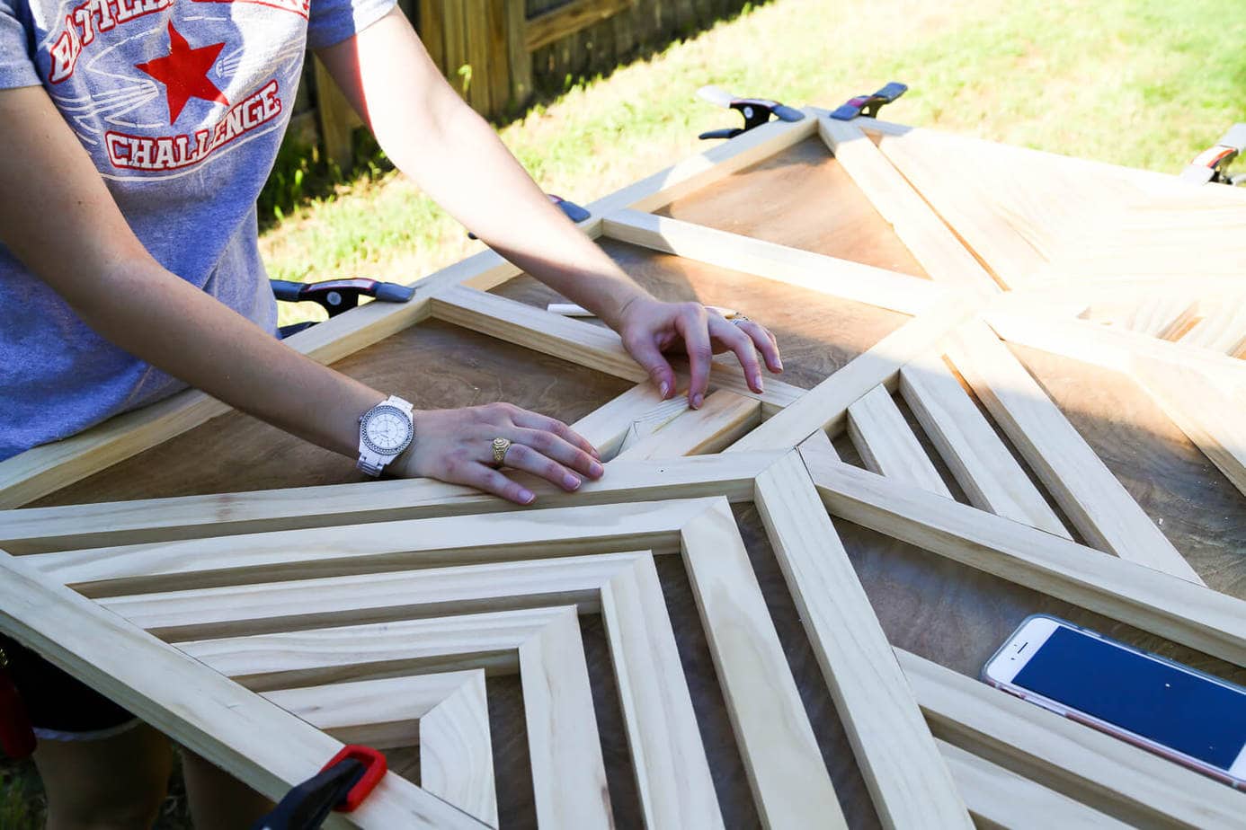 How to create a gorgeous large-scale wood wall art piece for your home. You just need some glue and a saw to cut it down! It's so easy that even a total beginner can do it, and it's absolutely gorgeous! 