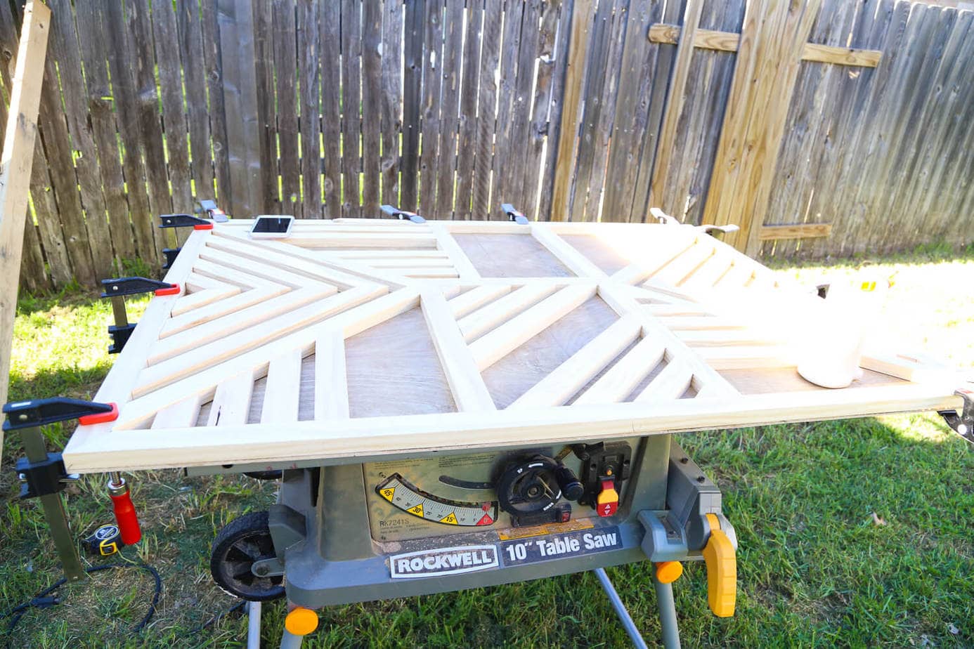 How to create a gorgeous large-scale wood wall art piece for your home. You just need some glue and a saw to cut it down! It's so easy that even a total beginner can do it, and it's absolutely gorgeous! 