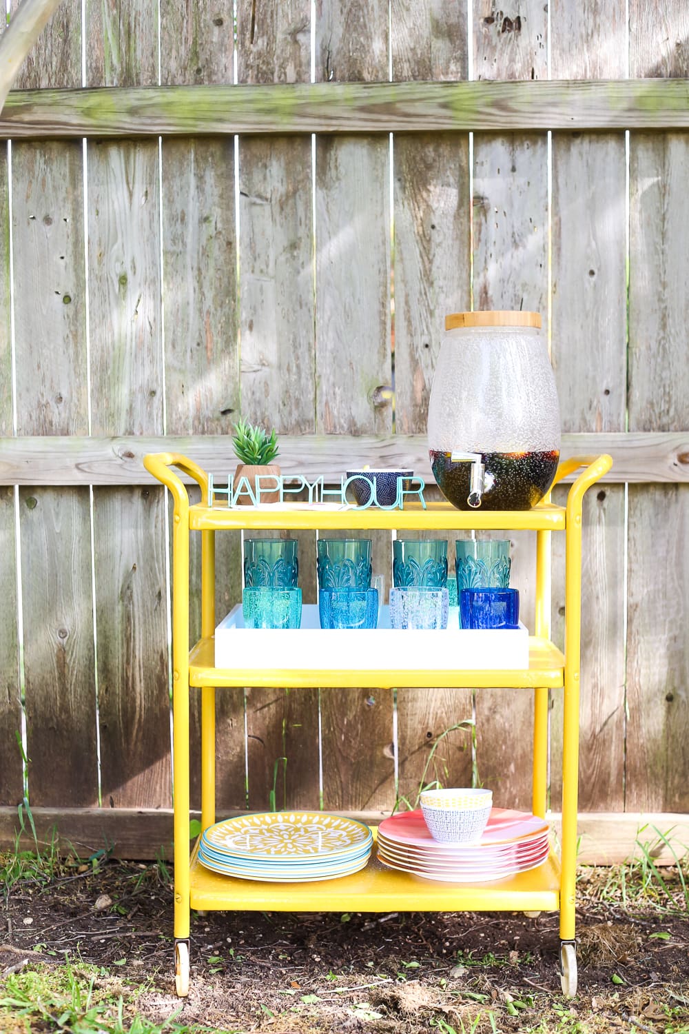 Rusty furniture makeover for a backyard bar cart