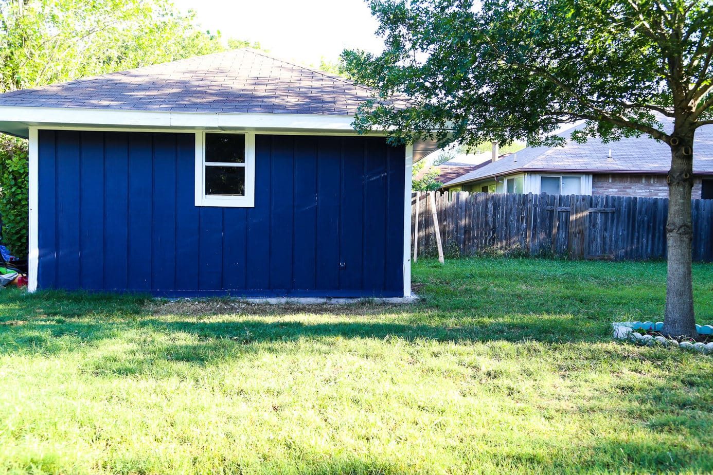 How to paint an exterior building using a paint sprayer - it will make a huge difference in how your entire yard looks and feels!