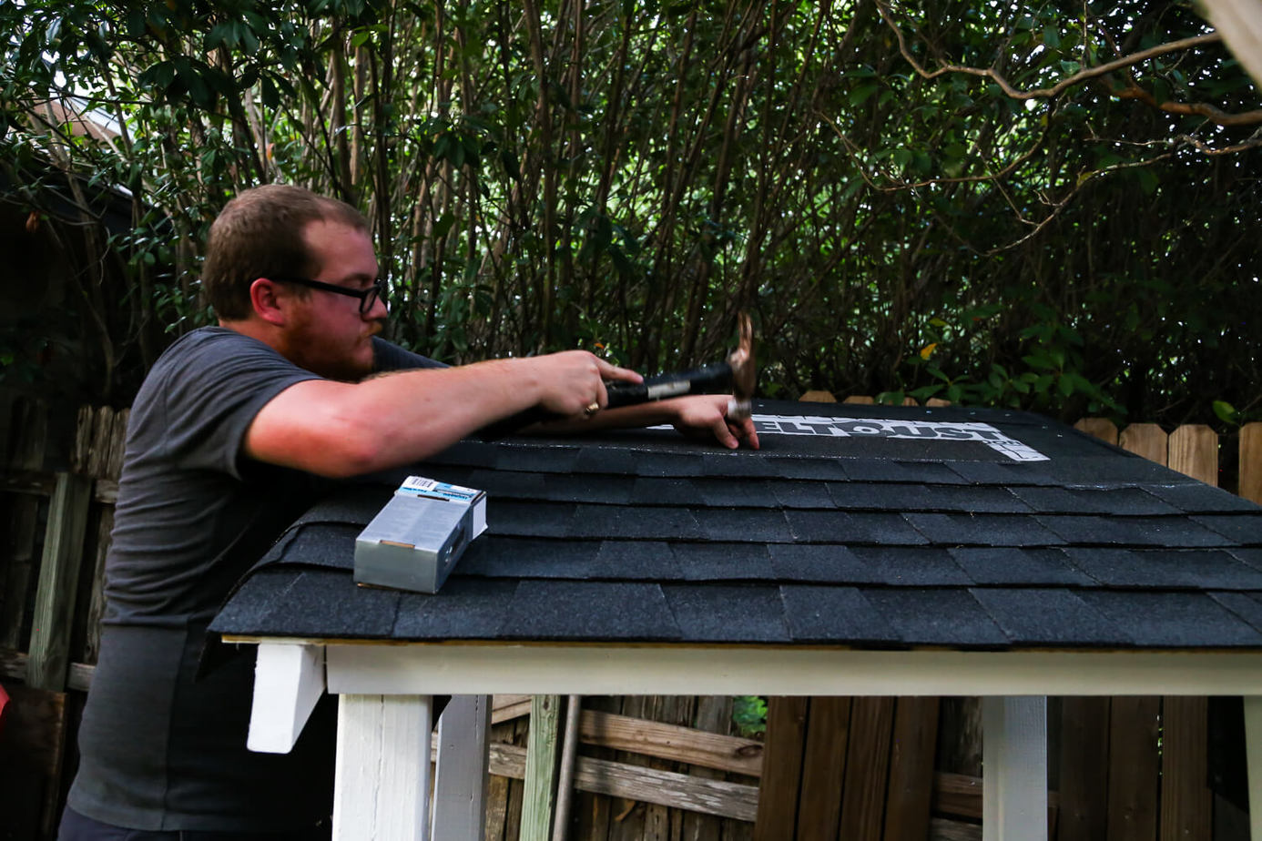 DIY installing shingles on a playhouse roof