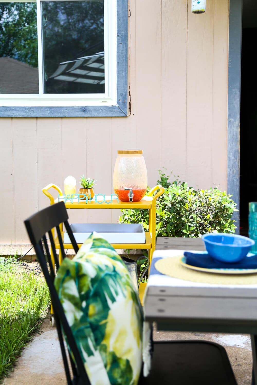 This patio is so gorgeous and cozy - and everything out here is so affordable! There are some great ideas for making a small patio feel spacious, and tips for choosing outdoor furniture. 