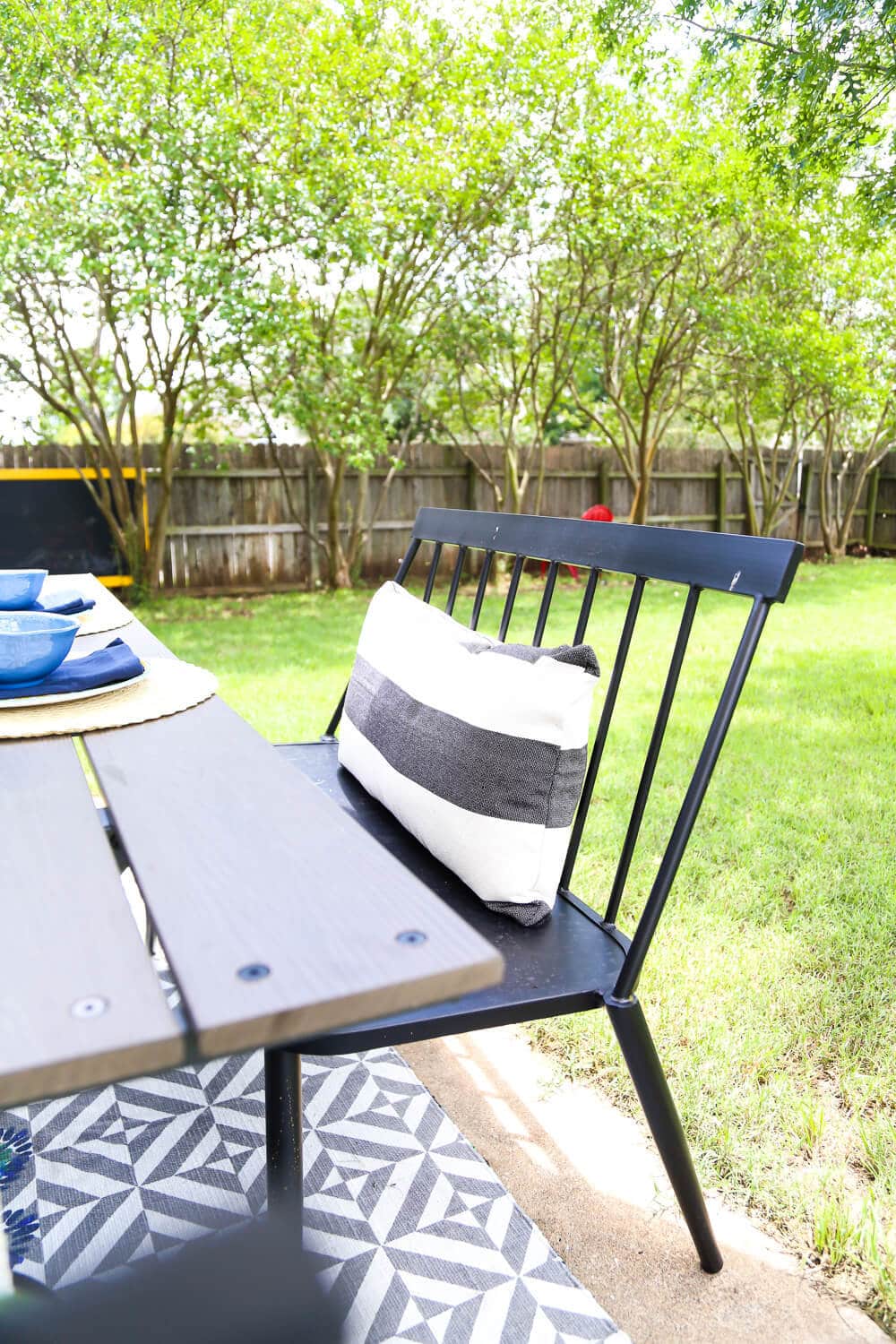 This patio is so gorgeous and cozy - and everything out here is so affordable! There are some great ideas for making a small patio feel spacious, and tips for choosing outdoor furniture. 