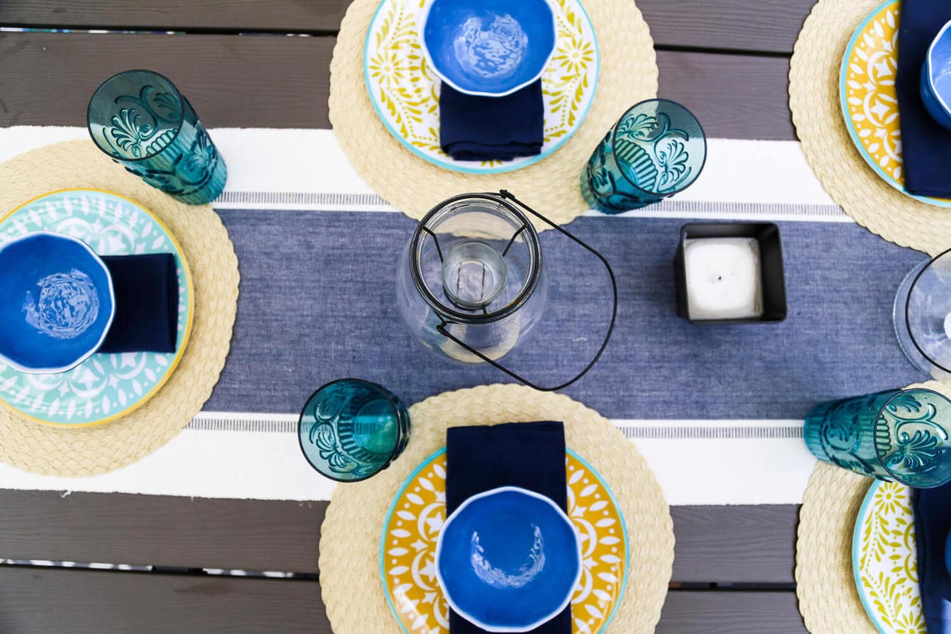 This patio is so gorgeous and cozy - and everything out here is so affordable! There are some great ideas for making a small patio feel spacious, and tips for choosing outdoor furniture. 
