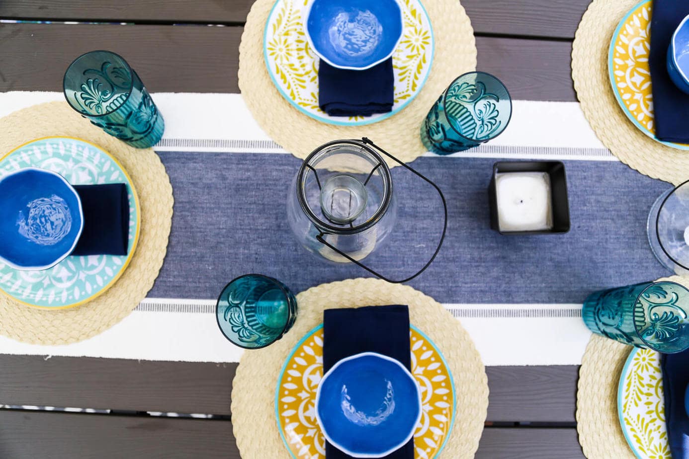 This patio is so gorgeous and cozy - and everything out here is so affordable! There are some great ideas for making a small patio feel spacious, and tips for choosing outdoor furniture. 