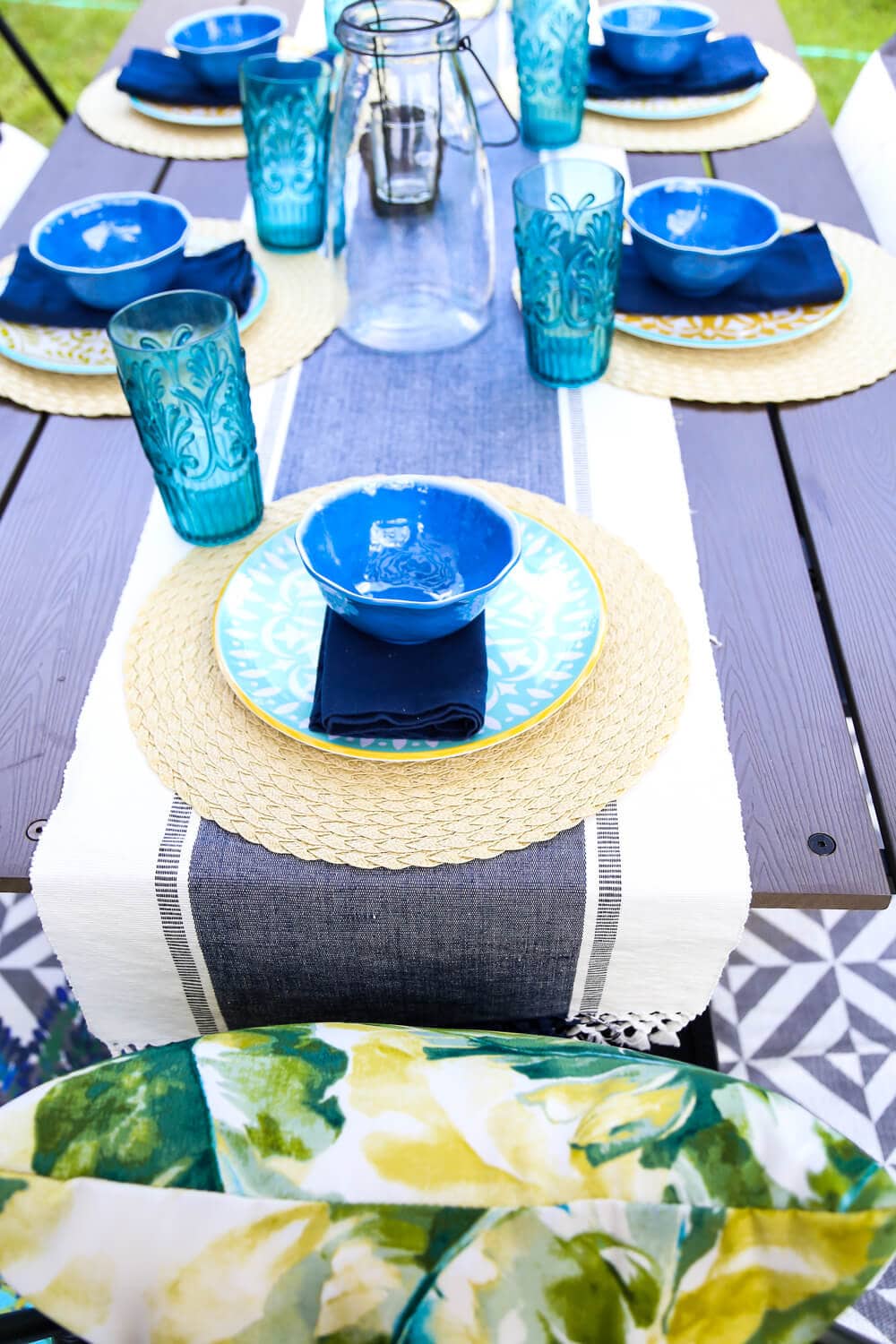 This patio is so gorgeous and cozy - and everything out here is so affordable! There are some great ideas for making a small patio feel spacious, and tips for choosing outdoor furniture. 