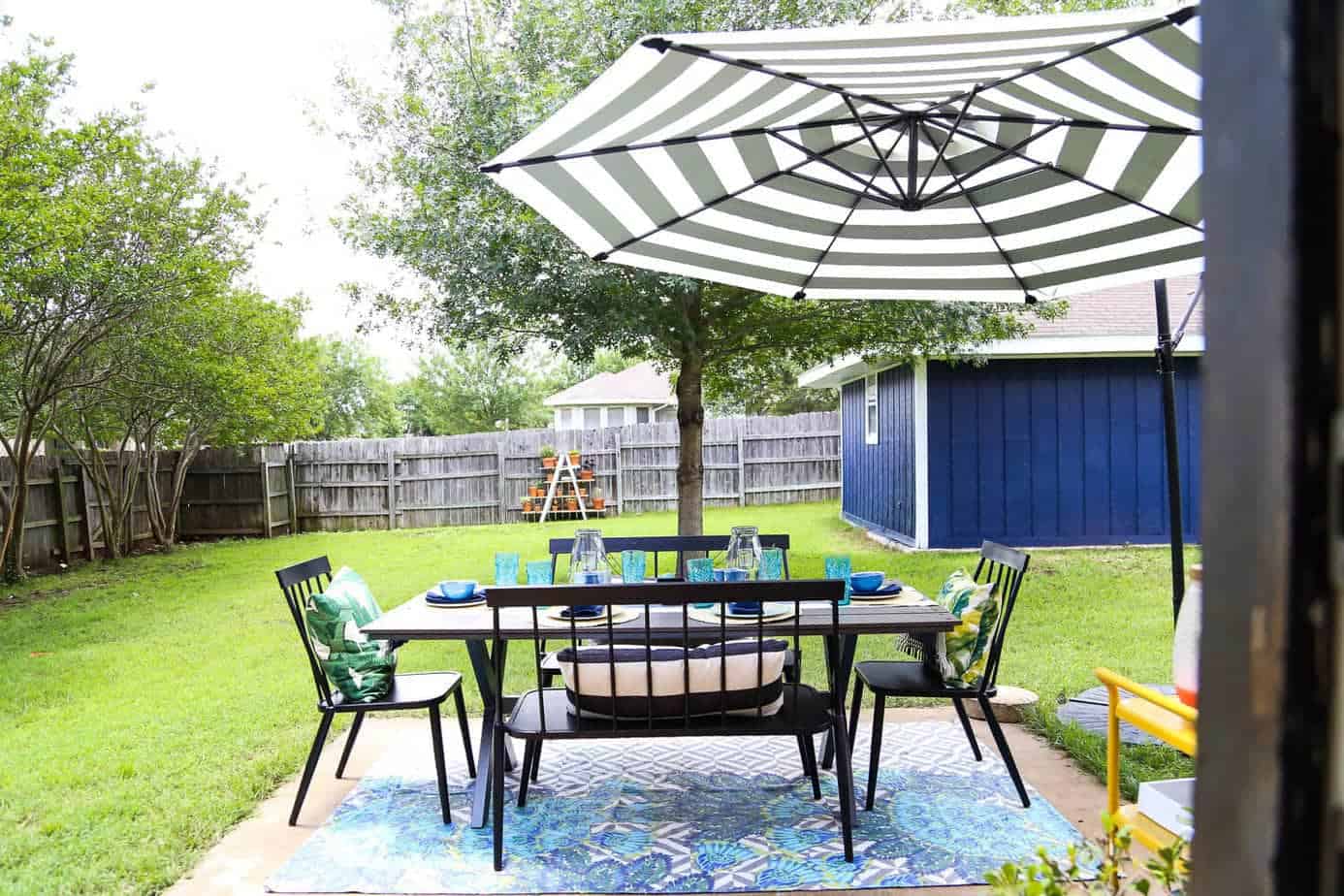 This patio is so gorgeous and cozy - and everything out here is so affordable! There are some great ideas for making a small patio feel spacious, and tips for choosing outdoor furniture. 