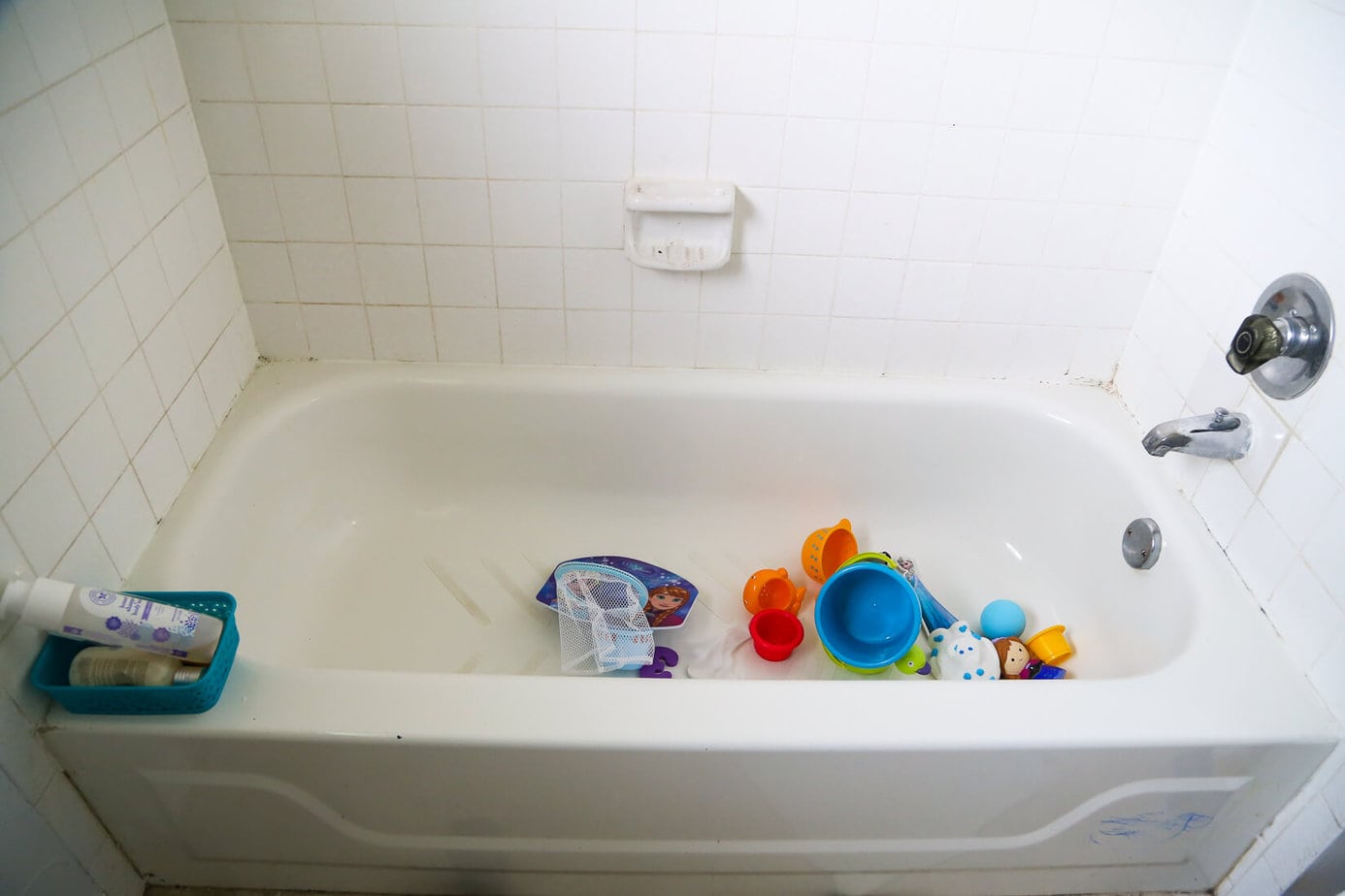 How to organize your bath toys in an attractive and affordable way using the FINTORP hanging baskets from IKEA. No more dripping toys in the middle of your bathtub! 