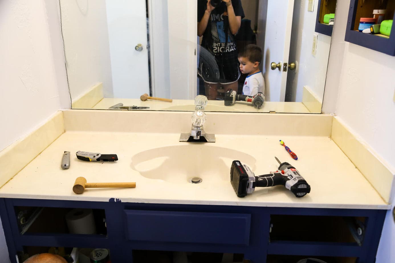 How to replace an ugly bathroom counter - it's quick, easy, and surprisingly affordable! Easy, budget-friendly option for getting a new counter in your bathroom without calling in a pro.