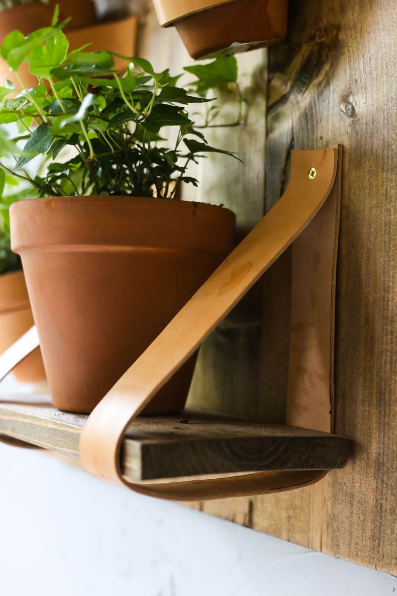 How to hang shelves using leather straps