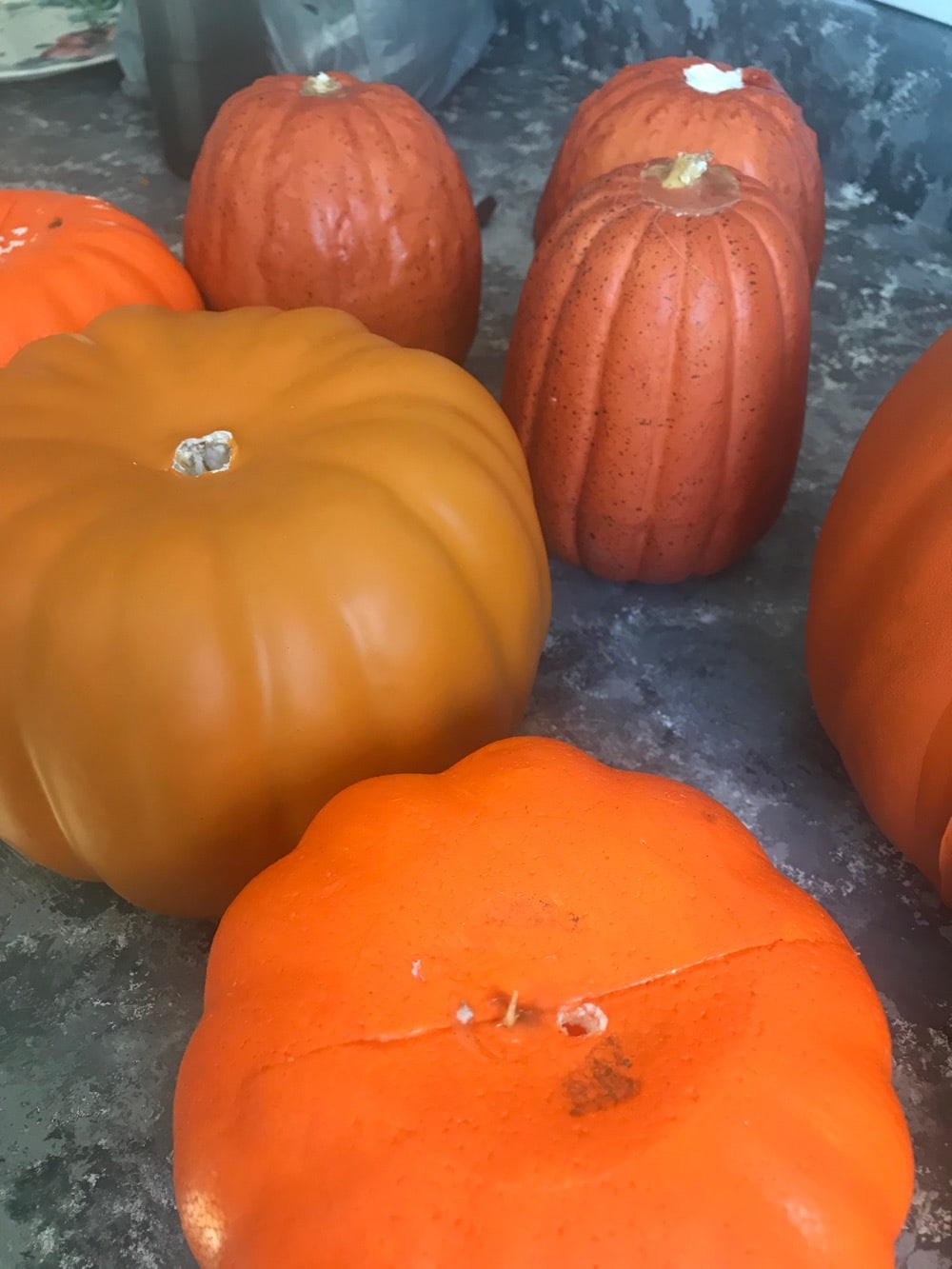 faux pumpkins with stems removed