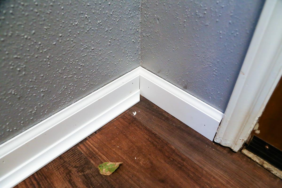 baseboard installation with trim partially installed 