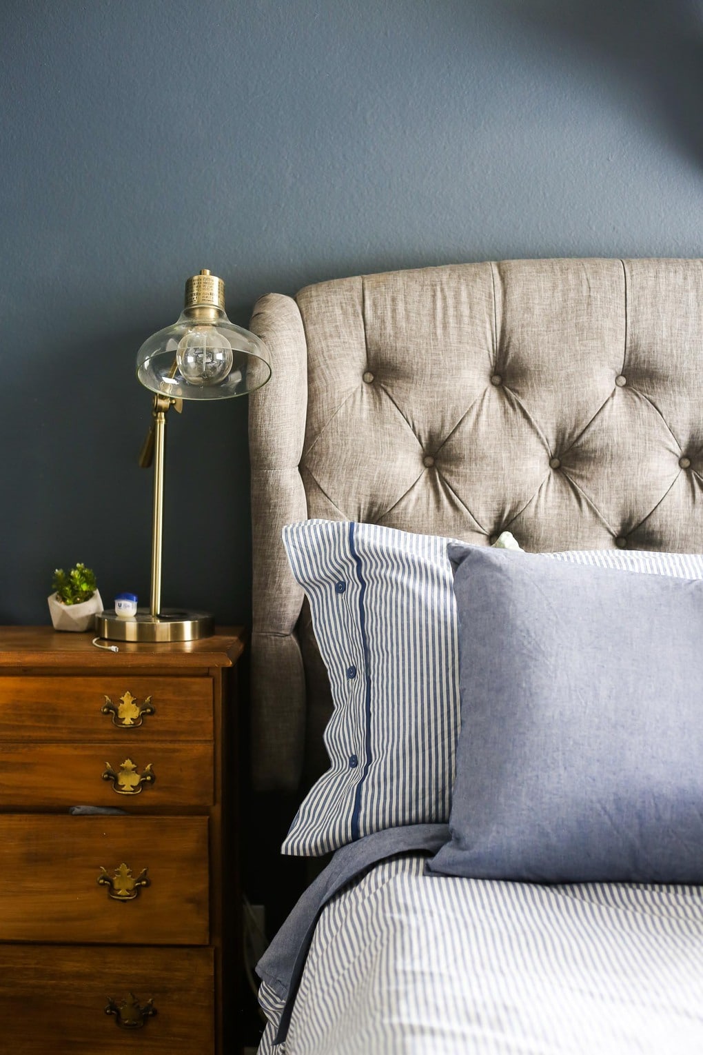 A beautiful navy blue master bedroom