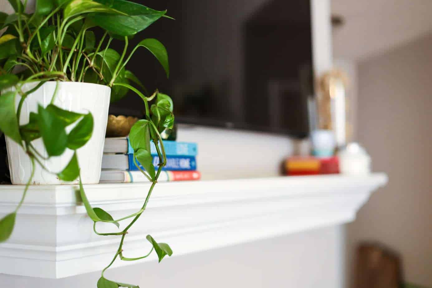 decorating a mantel with a television hanging