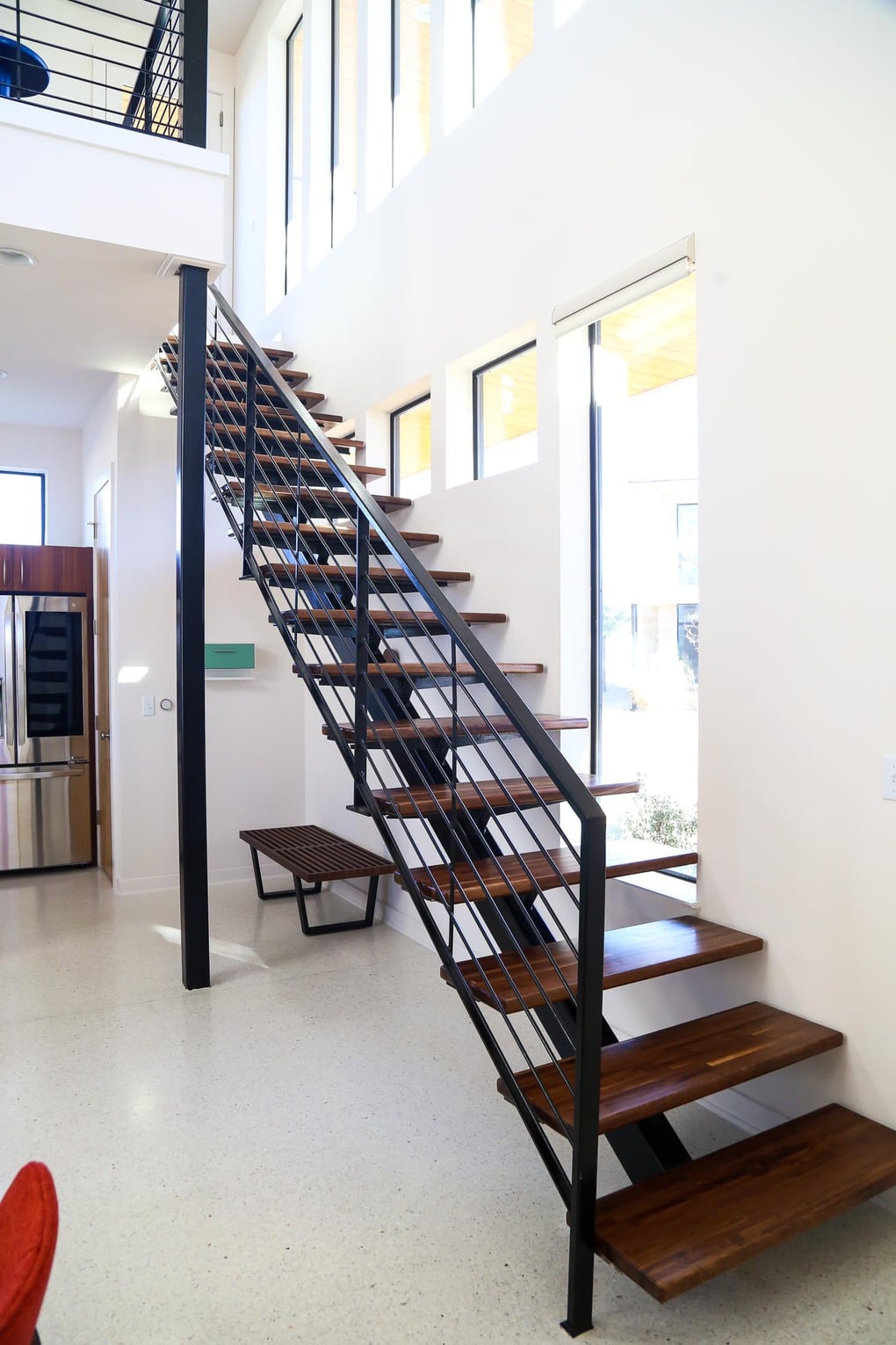 Gorgeous open staircase with midcentury modern design