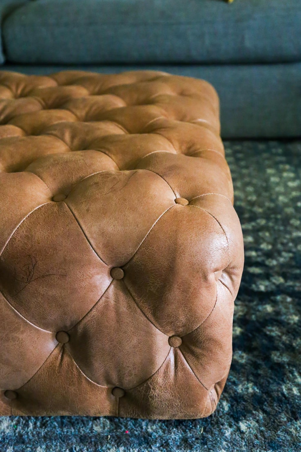 Close-up of leather ottoman after cleaning