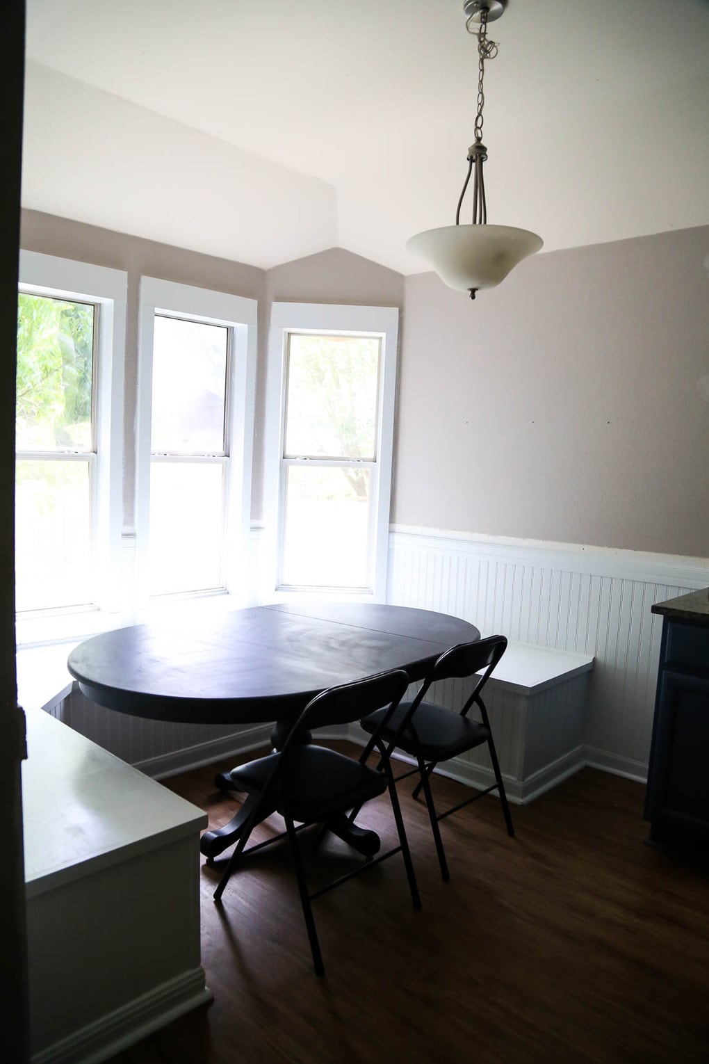Banquette and beadboard in dining room