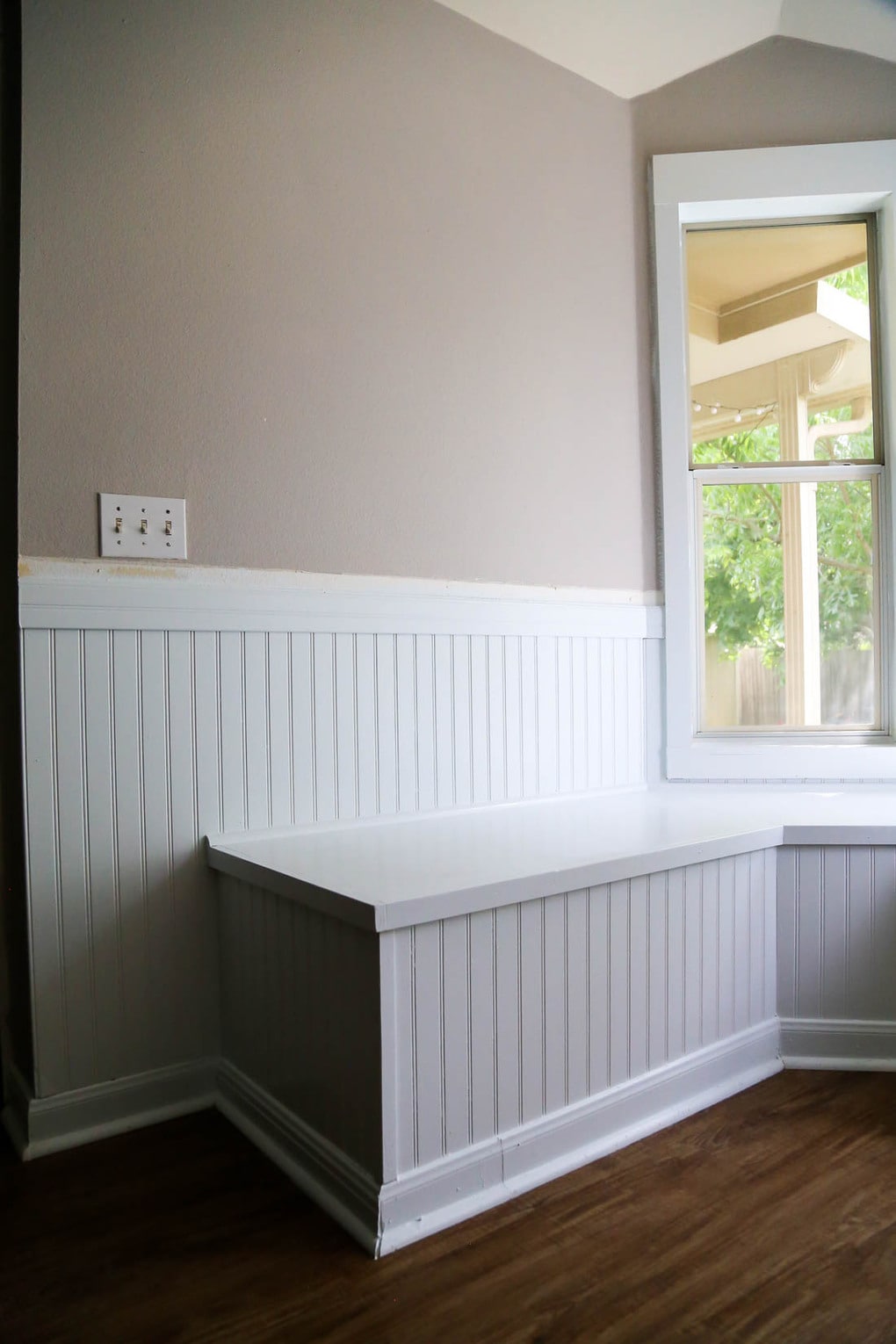 Banquette with beadboard on walls